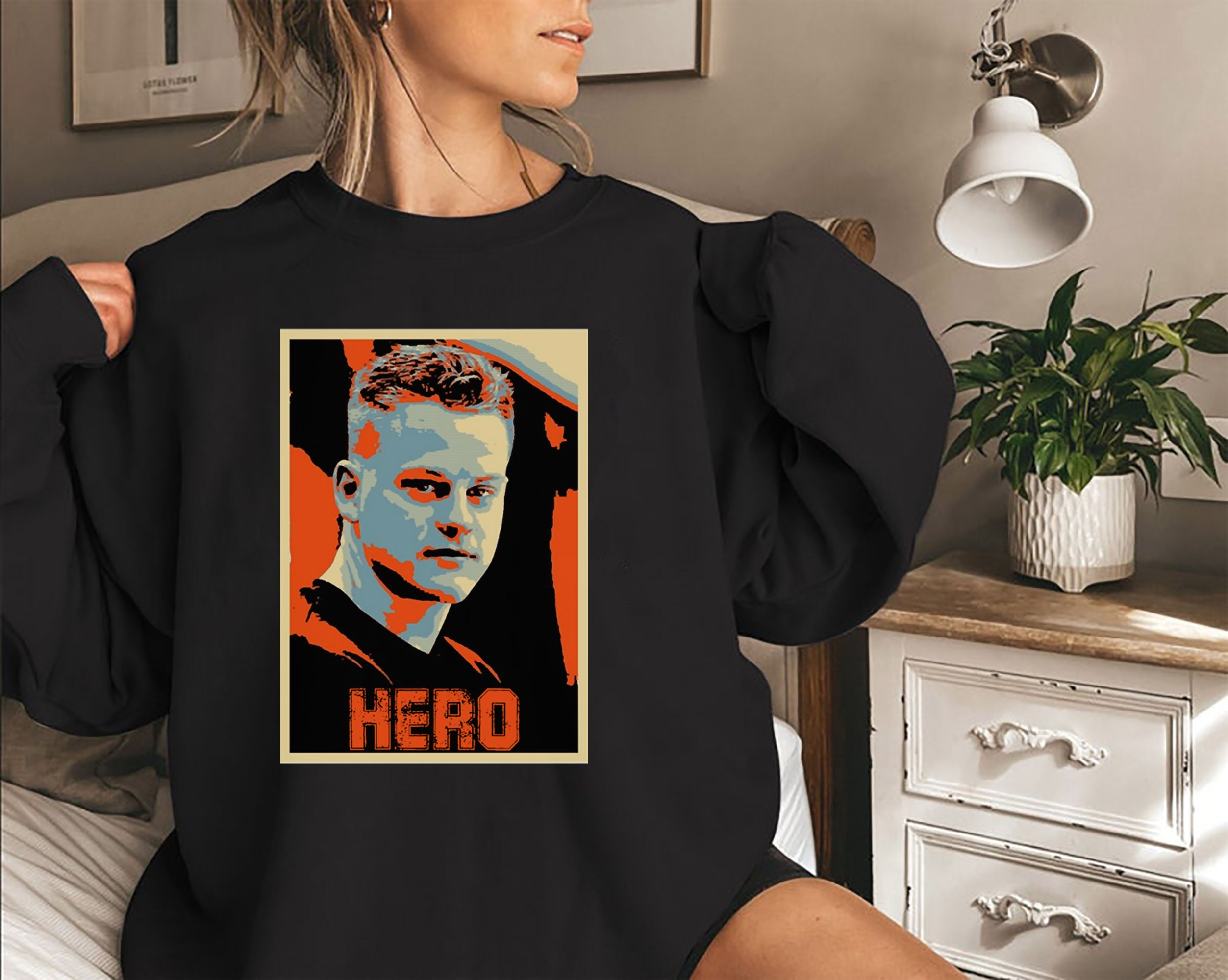 Joe Burrow Cincinnati Bengals 2022 Champion AFC North Division Sweatshirt Joe Burrow Cincinnati Bengals 2022 Champion AFC North Division Sweatshirt